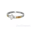 Женское серебряное кольцо с золотыми пластинами "Секрет"
